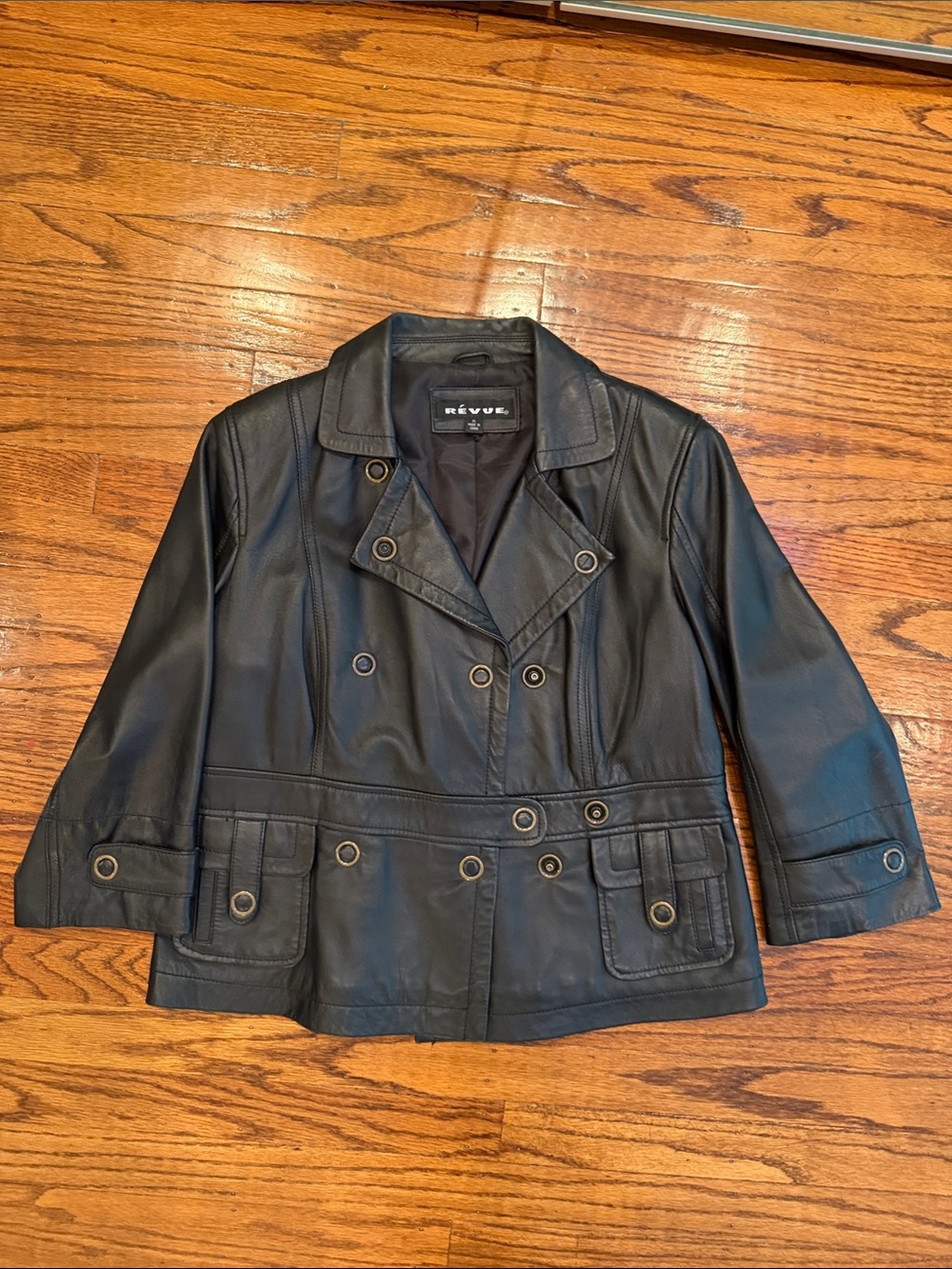 Révúé Women's Black Double-Breasted Leather Jacket with Grommet Detail